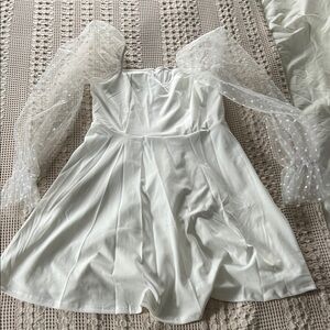 Elegant White Dress with Sheer Sleeves